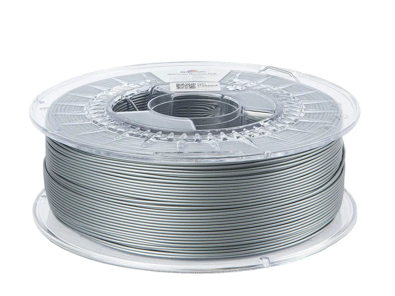 Bobine de filament gris argenté vue de trois quarts, enroulée sur une bobine transparente