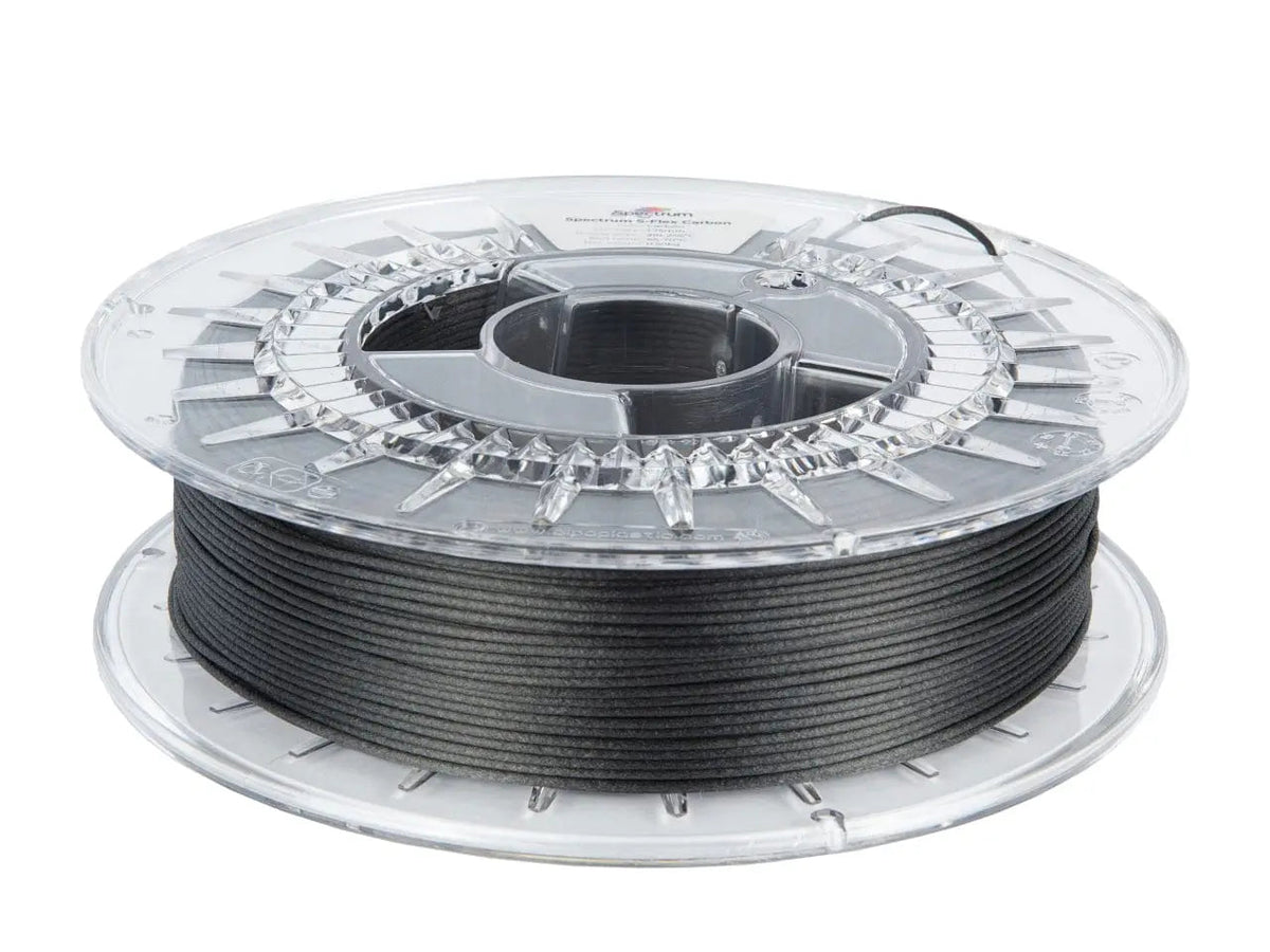Bobine de filament noir transparent, vue de trois quarts, avec enroulement visible sur la bobine