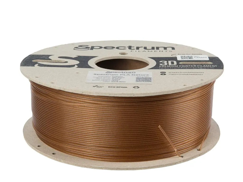 Bobine de filament brun cuivré Spectrum Nature PLA, vue de trois quarts avec l’étiquette sur le dessus
