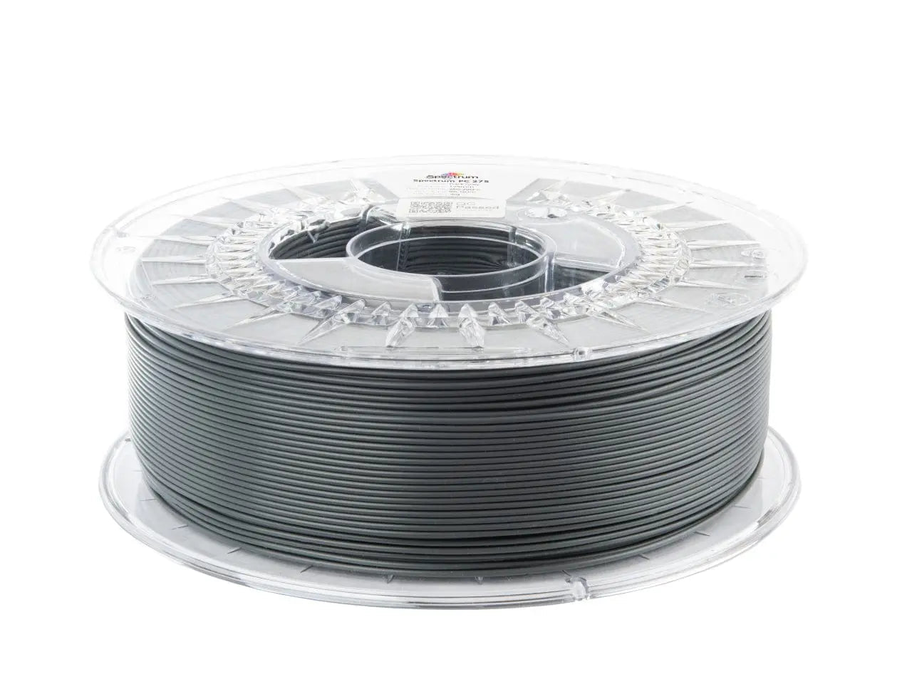 Bobine de filament gris fer enroulée sur une bobine transparente, vue de trois quarts sur fond blanc