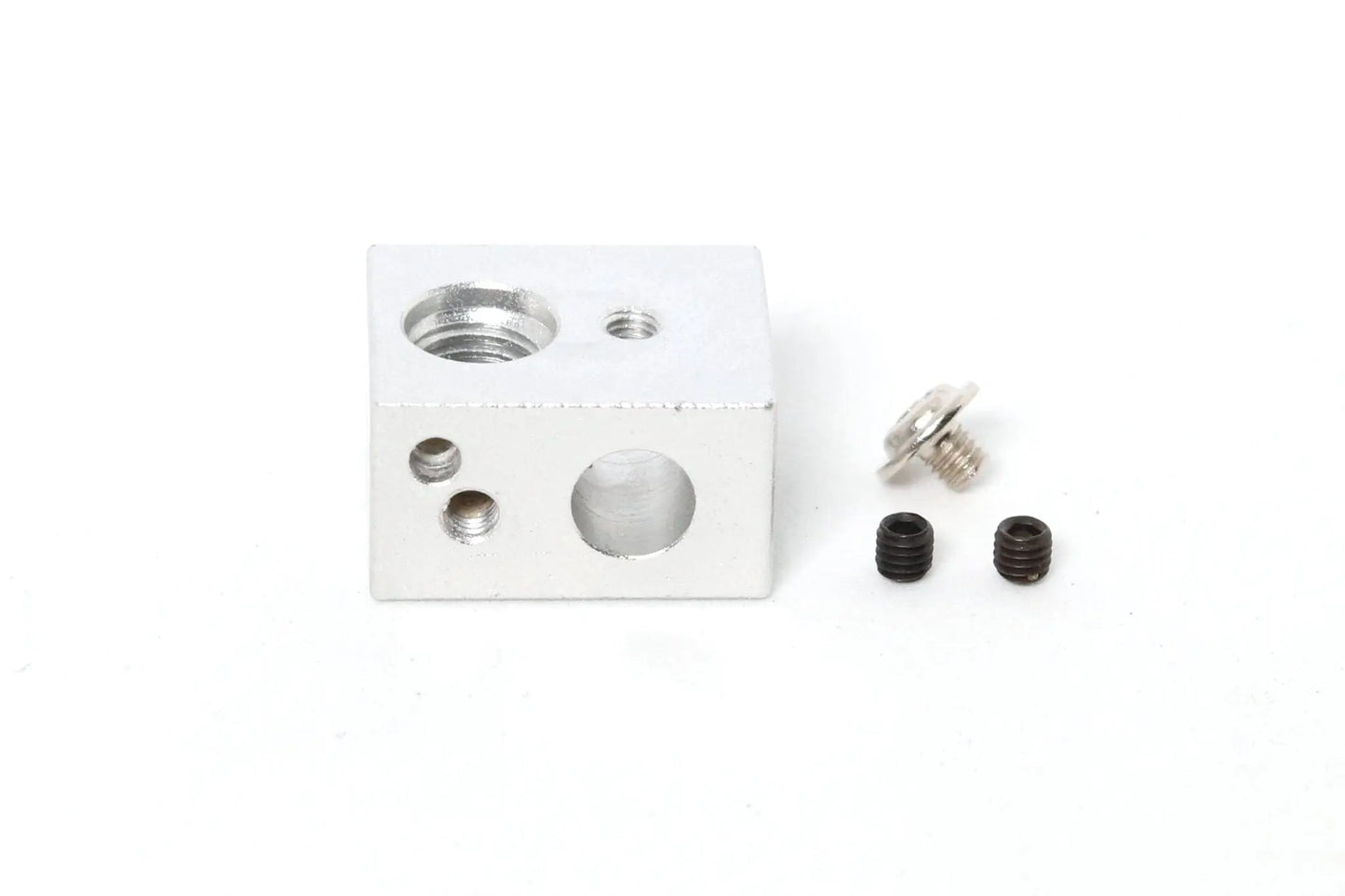 Bloc chauffant en aluminium argenté, vu de face sur fond blanc, avec trois inserts filetés noirs et une vis à côté