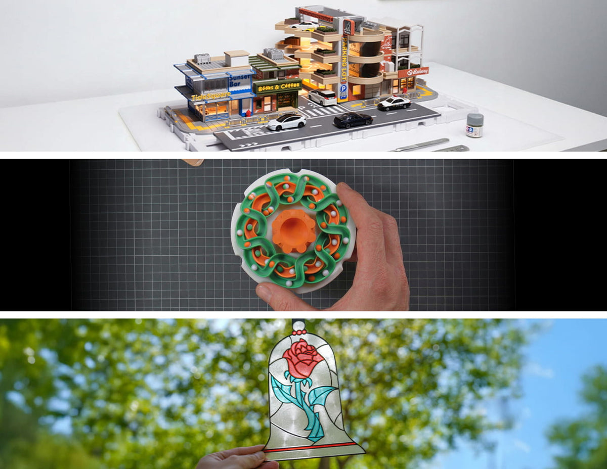 Trois exemples imprimés en 3D : une maquette de rue, une pièce circulaire colorée tenue en main et une rose décorative