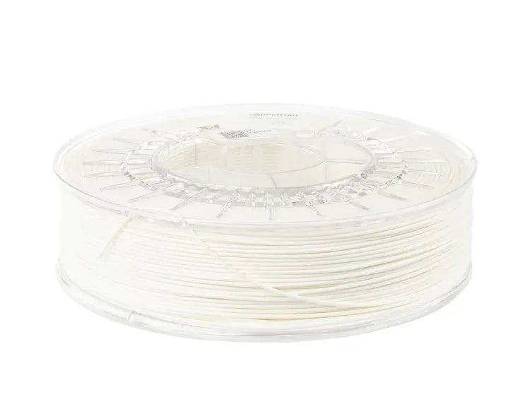 Bobine transparente de filament naturel enroulé, vue de trois quarts sur fond blanc