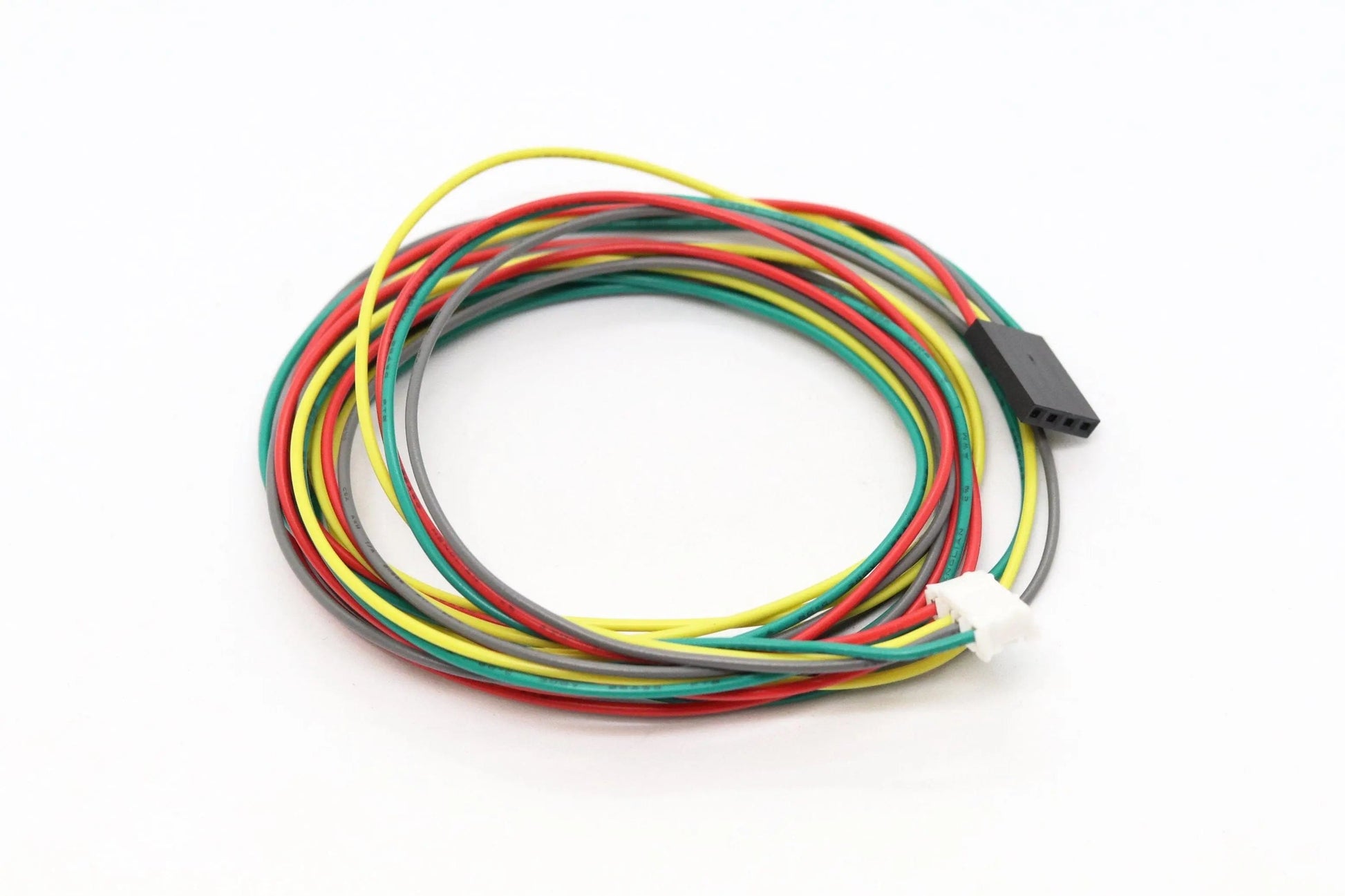 Câble multicolore enroulé avec connecteur noir 4 broches et prise blanche à l’autre extrémité