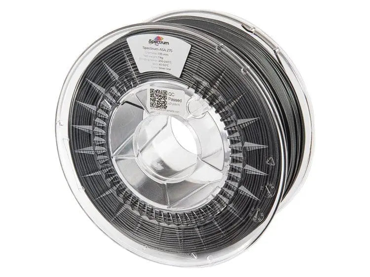 Bobine de filament noir enroulée dans une bobine transparente, vue de face sur fond blanc